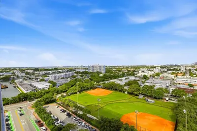 an aerial view of a baseball field in a city at 72 Park - Miami Beach Condo w Beach Access in Miami Beach
