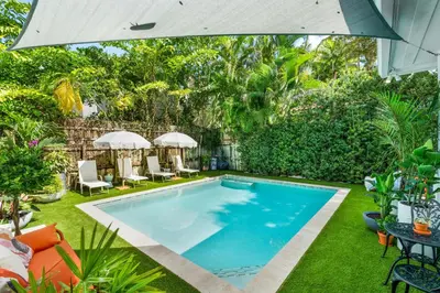a swimming pool in the yard of a house at Garden Grove- Miami Home with Private Pool in Miami