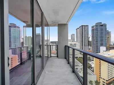 a balcony with a view of a city skyline at X Lounge VII-Private Sky Residence in Miami