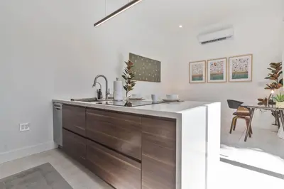 a kitchen with a sink and a counter at Luxury Miami Oasis with Heated Pool and BBQ Grill in Miami