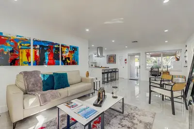 a living room with a couch and a table at JS & JS 2040 LLC in Fort Lauderdale