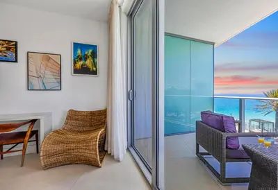 a living room with a view of the ocean at Lyfe Resort l Ocean Pool View Gym, Beach Access in Hollywood