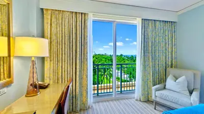 a living room with a desk and a large window at Modern Miami Suite Near the Beach in Miami