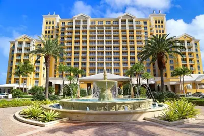 a fountain in front of a large building at Modern Miami Suite Near the Beach in Miami