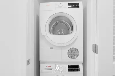 a white washer and dryer in a room at Beautiful Apt -Private Balcony & Pool in Miami Beach