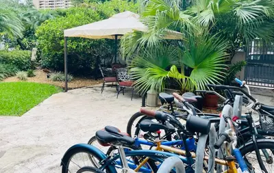 a group of bikes parked next to a patio at South Beach Paradise Jr Suite next to Convention Center in Miami Beach