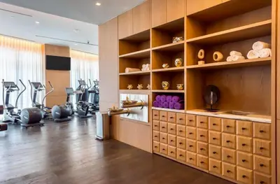 a fitness room with a gym with treadmills and exercise equipment at SLS Lux Brickell Exclusive by Palermo Home Miami in Miami