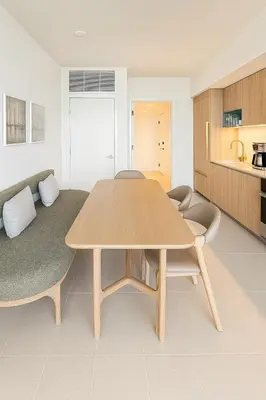 a living room with a table and a couch at Luxury 3BR Apt with Epic Biscayne Bay Views in Miami
