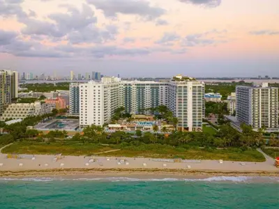an aerial view of a beach and buildings at Villa DecoBlu in Miami Beach