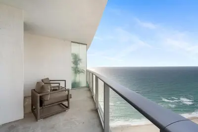 a room with a view of the ocean at Corner Penthouse Ocean and City View in Hollywood