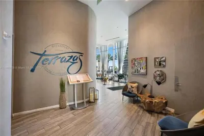 a lobby with a sign on the wall of a building at Corner Penthouse Ocean and City View in Hollywood
