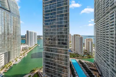 a view of a river between two tall buildings at Luxury Waterfront Brickell ICON W-Hotel Balcony Water Views in Miami