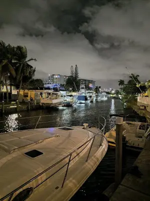 a group of boats are docked in a harbor at 1 Bedroom Apt With Patio in South Riverside in Miami
