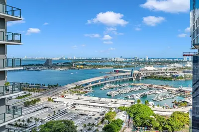 a view of a marina with boats in the water at Miami City Lights 2BR 2BA in Miami