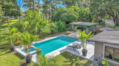 an overhead view of a swimming pool in a yard at Almost Famous - Pool - Jacuzzi in Fort Lauderdale