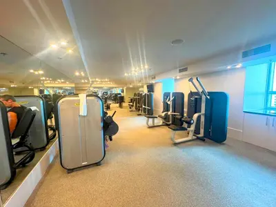 a room with rows of chairs in a train at City View Condo in the Heart of Brickell in Miami