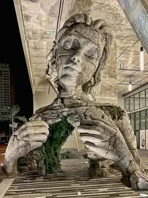 a large statue of a face in a building at Steps to Sand! - Wellness Escape - Coastal Retreat in Fort Lauderdale