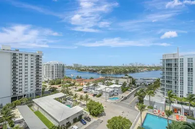 an aerial view of a city with a river and buildings at Luxe Bayview Condo w Sauna, Hot tub & Beach Access in Fort Lauderdale