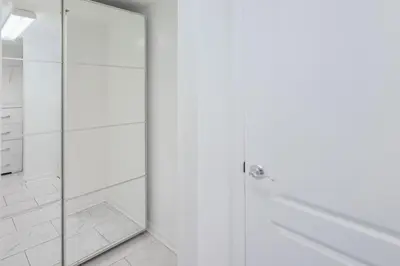 a shower with a glass door in a bathroom at Luxury Bayview Condo | Pool, Gym & Skyline Views in Miami