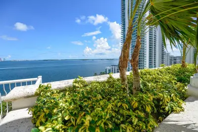 a view of the ocean from the balcony of a resort at Luxe 2BD Unit | W Sauna, Pool & Gym access in Miami