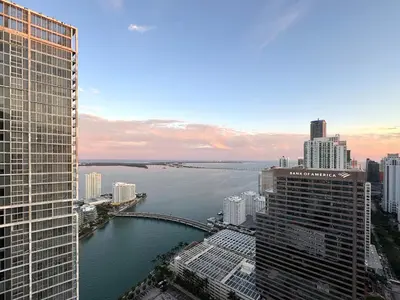 a view of a city with a river and buildings at Modern 1B at Icon Brickell 32nd fl Pool Spa Gym FREE Parking Scenic view in Miami