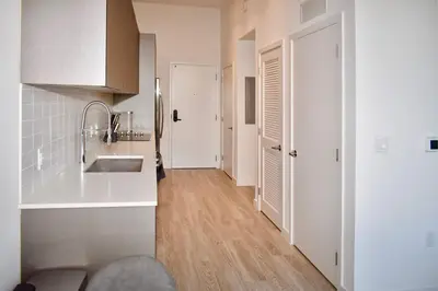 a kitchen with a sink and a white counter top at The Juliet VIII Vibe 8706 in Miami