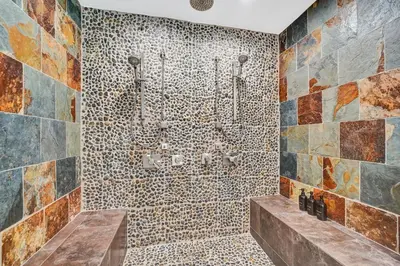 a tiled bathroom with a shower and a tub at The Porch House - 3 Bed 2 Bath Pool Home in Hollywood