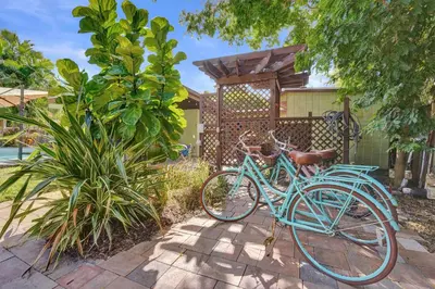 two bikes parked in front of a house at The Porch House - 3 Bed 2 Bath Pool Home in Hollywood