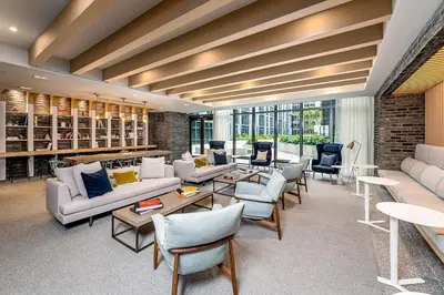 a living room with couches and chairs and tables at The Juliet XIV Vibe 8801 in Miami