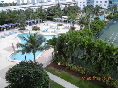 an overhead view of a pool at a resort at Beautiful Sunny Isles apt 1br with PRIVATE TERRACE in Sunny Isles Beach