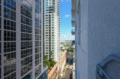 a view from a window of a city with tall buildings at Modern Luxury Studio for Two in Downtown in Miami