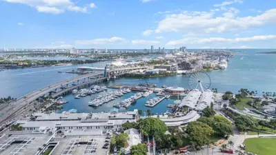 an aerial view of a harbor with boats in the water at Prime Downtown Stay 2BR- Parking Included -Near Bayside & Cruise Port in Miami