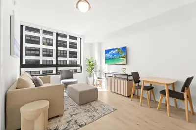 a living room with a couch and a table at Prime Downtown Location - Amazing Amenities & Top Location in Miami