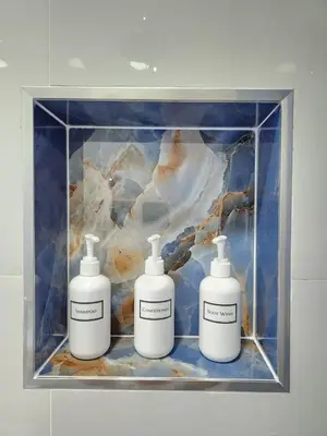 a picture of three white bottles in a glass case at Private & Quiet Retreat Near Hard Rock Stadium and Guitar Hotel in Pembroke Pines