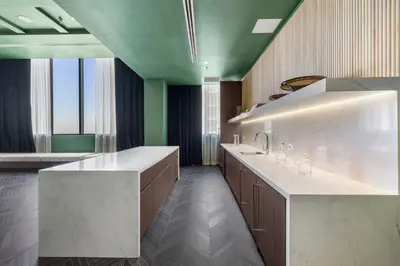 a kitchen with a white counter and a sink at Downtown lifestyle - Luxury condo & Rooftop Pool in Miami