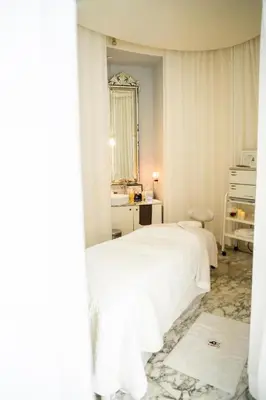 a bedroom with two white beds and a mirror at Brickell 35th Floor Residence with Saltwater Pool 5-Star Amenities in Miami