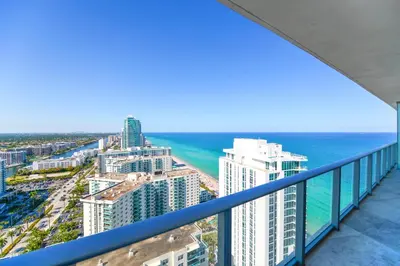 a view of the ocean from the balcony of a condo at Luxury Condo with Beach Access in Hollywood