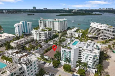an aerial view of a city with buildings and the ocean at 2BR near Bal Harbour beautiful in Miami Beach