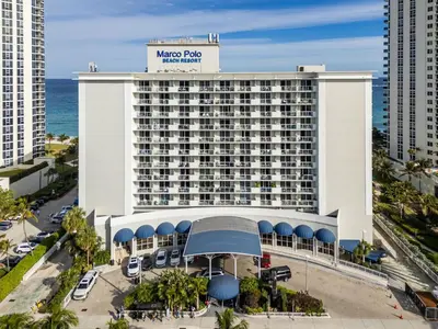 an aerial view of the mgm reef hotel at Beachfront Resort Studio with 2 Queen beds, Balcony & Pool in Sunny Isles Beach