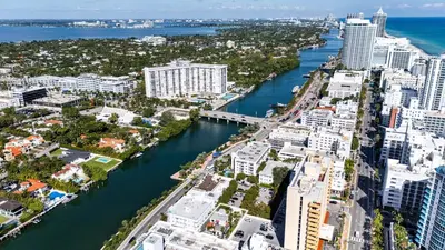 an aerial view of a city with a river and buildings at Art Deco Escape Steps to Ocean & Free Parking in Miami Beach