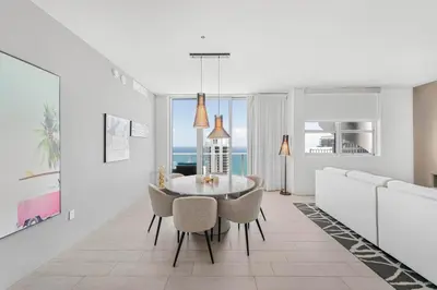 a white dining room with a table and chairs at Hyde Dream Penthouse in Hollywood