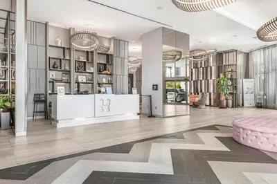 a lobby with a pink ottoman in a room at Hyde Dream Penthouse in Hollywood