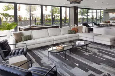 a living room with a white couch and tables at Blueground Coral Gables pool wd nr Vizcaya MIA-125 in Miami