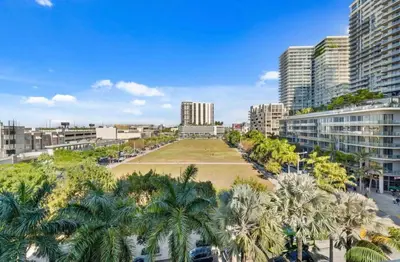 an aerial view of a city with palm trees and buildings at Midtown Miami Marvel- Heated Pool & Prime Location in Miami