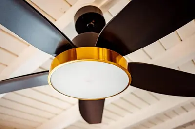 a ceiling fan with a white light on it at Bimini Bliss Waterfront Pool Retreat in Fort Lauderdale