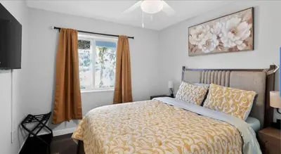 a bedroom with a bed and a window at New 3BR in Central Miami Location for Family & Groups in Miami