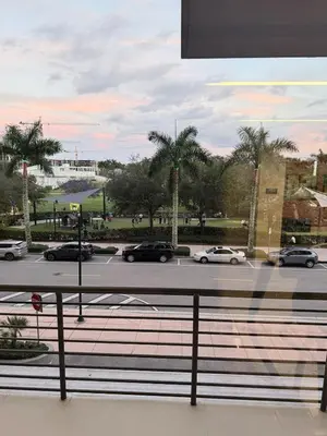 a view of a parking lot with cars on a street at Stylish Urban 5350 Park Doral in Miami