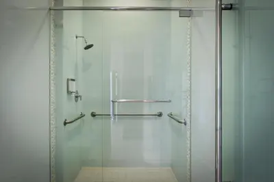 a shower with a glass door in a bathroom at Spacious 1BR Loft Villa - Pool Golf - Doral Downtown in Miami