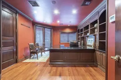 a home office with a desk and chairs in a room at Serene 7000 SF Gated Luxury Waterfront Home in Fort Lauderdale