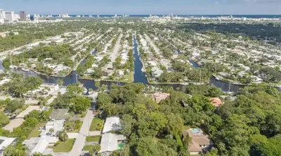 an aerial view of a park with a city in the background at Serene 7000 SF Gated Luxury Waterfront Home in Fort Lauderdale